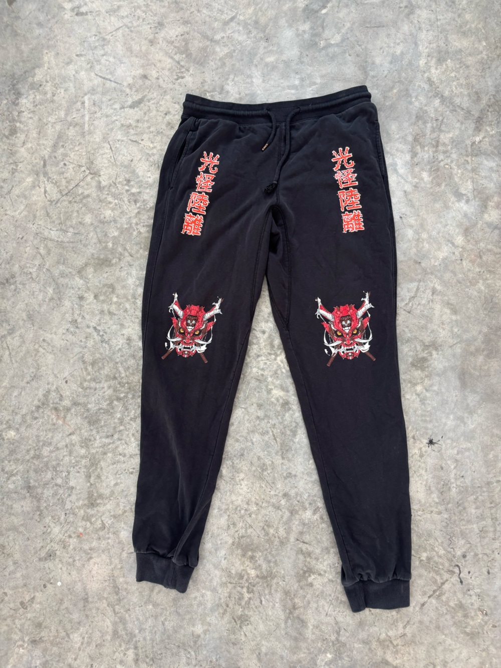 SLAYCOLD Black Sweatpants with Red Oni Graphics and Kanji